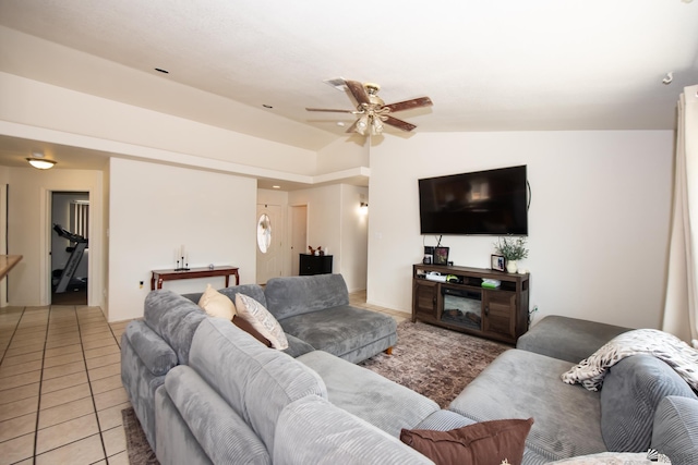 living room featuring a ceiling fan and light tile patterned flooring
