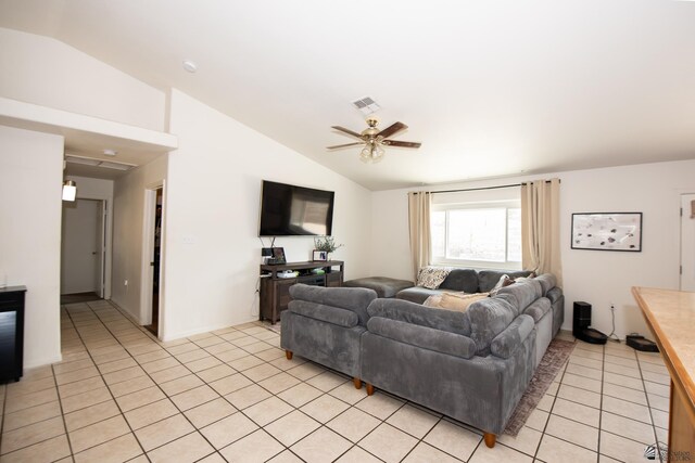 living area featuring light tile patterned floors, a ceiling fan, vaulted ceiling, and visible vents