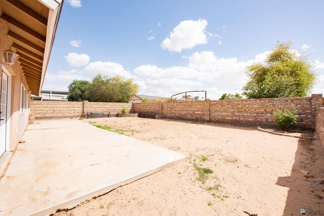 9603 E 36th Pl, Yuma, AZ 85365 - fenced backyard featuring a patio area