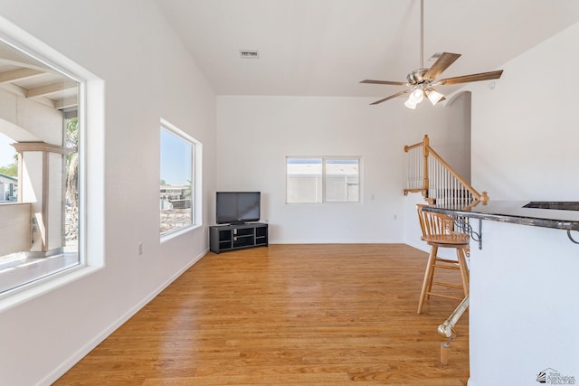 unfurnished living room with plenty of natural light, light wood-style flooring, and visible vents