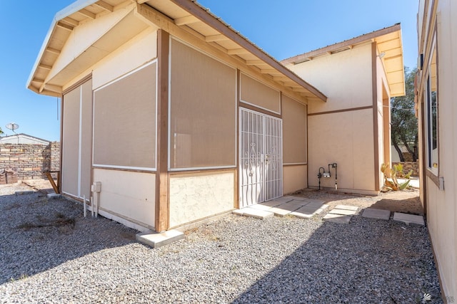 exterior space with stucco siding