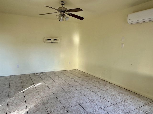 2176 E 14th Pl, Yuma, AZ 85365 - empty room featuring light tile patterned floors, baseboards, a ceiling fan, and a wall mounted air conditioner