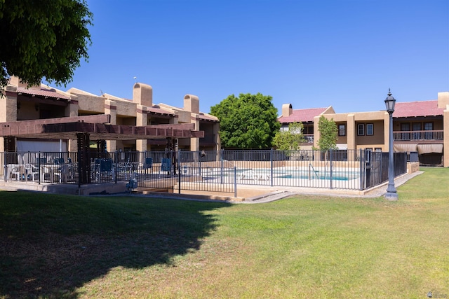 800 E Country Club Dr Unit 26, Yuma, AZ 85365 - view of yard featuring a community pool and a patio area