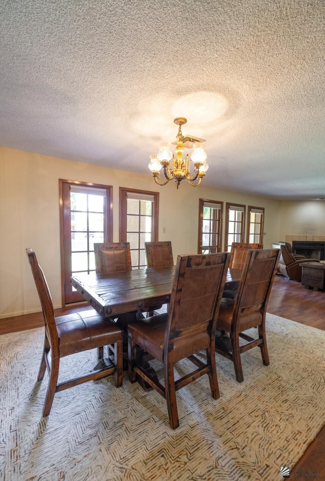 800 E Country Club Dr Unit 26, Yuma, AZ 85365 - dining area featuring a chandelier and a textured ceiling