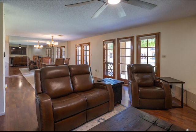 800 E Country Club Dr Unit 26, Yuma, AZ 85365 - living room featuring a ceiling fan, wood finished floors, a chandelier, a textured ceiling, and baseboards