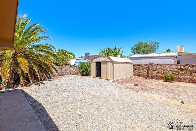 13466 E 47th St, Yuma, AZ 85367 - fenced backyard with a storage unit