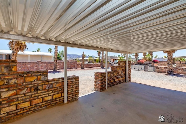13466 E 47th St, Yuma, AZ 85367 - fenced backyard with a patio and a mountain view