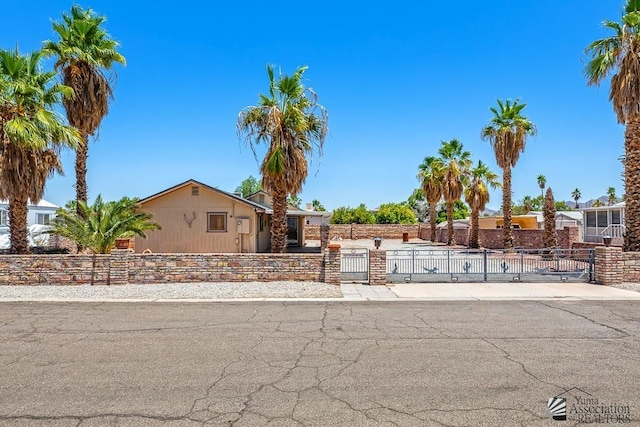 13466 E 47th St, Yuma, AZ 85367 - view of front of property with a gate and a fenced front yard