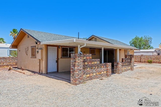 13466 E 47th St, Yuma, AZ 85367 - view of front of house featuring roof with shingles