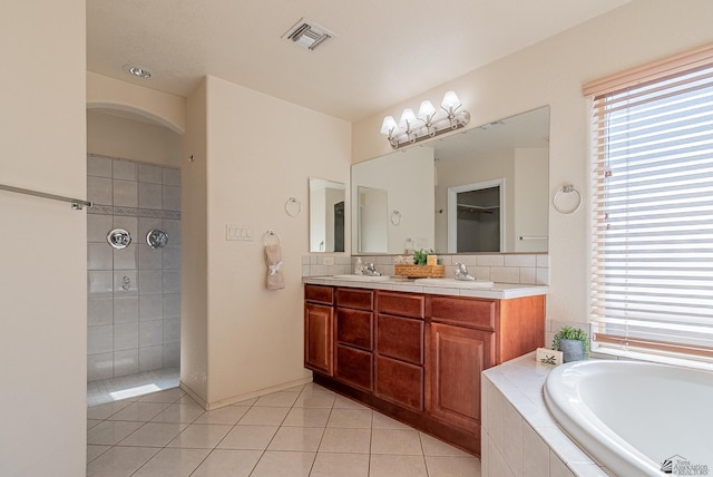 11594 E 27th Pl, Yuma, AZ 85367 - full bath with plenty of natural light, tile patterned floors, a bath, and double vanity