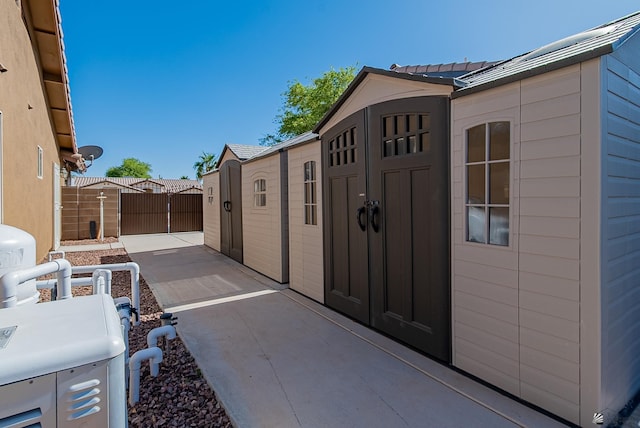 11594 E 27th Pl, Yuma, AZ 85367 - view of shed featuring fence and a gate