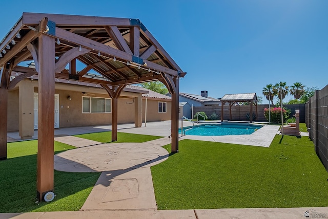 11594 E 27th Pl, Yuma, AZ 85367 - view of swimming pool featuring a gazebo, ceiling fan, and a patio