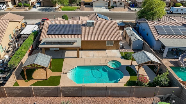 11594 E 27th Pl, Yuma, AZ 85367 - view of swimming pool featuring a residential view and a pool with connected hot tub