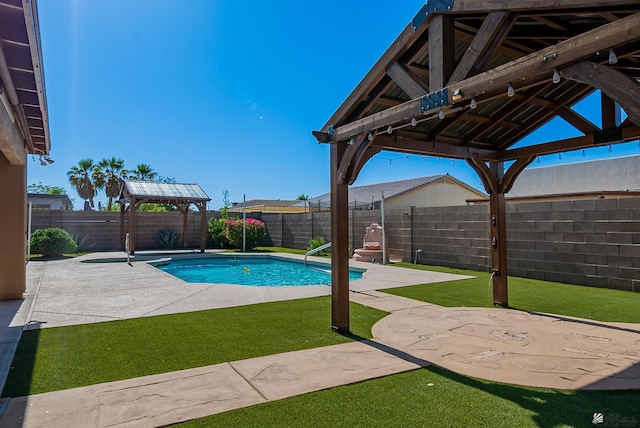 11594 E 27th Pl, Yuma, AZ 85367 - view of swimming pool with a gazebo and a patio