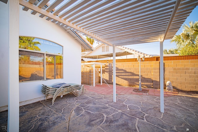 view of patio with a fenced backyard and a pergola
