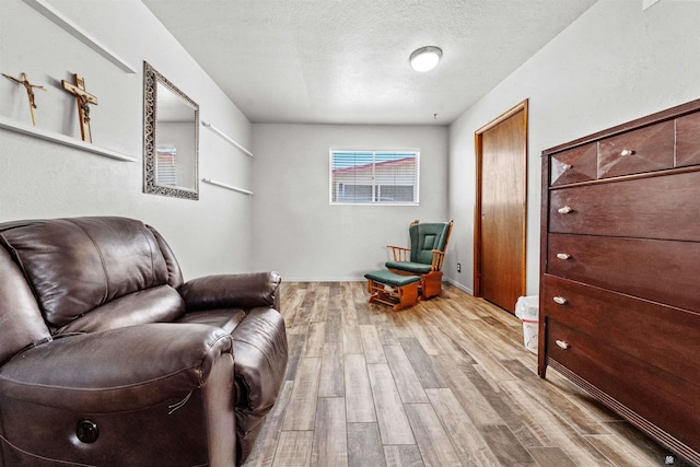 2621 S Walnut Ave, Yuma, AZ 85364 - living area with wood finished floors and a textured ceiling