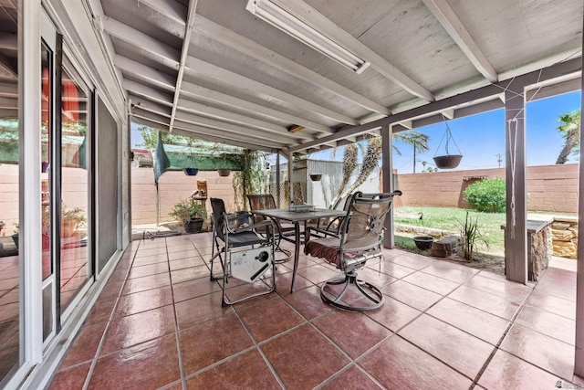 2621 S Walnut Ave, Yuma, AZ 85364 - sunroom / solarium with outdoor dining space and beamed ceiling