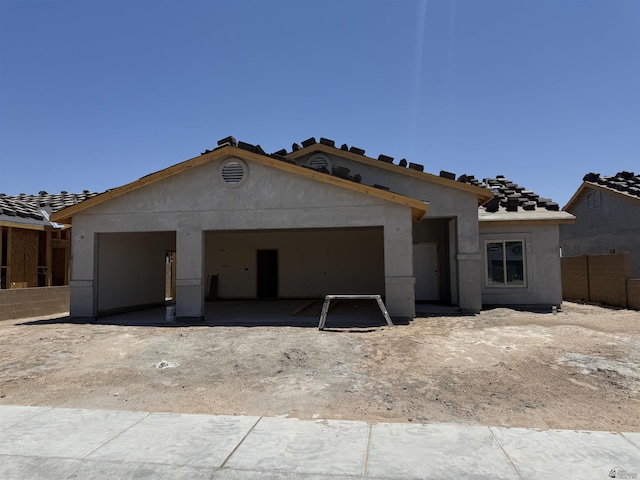 12683 E 51st Pl, Yuma, AZ 85367 - view of front facade with an attached garage and stucco siding