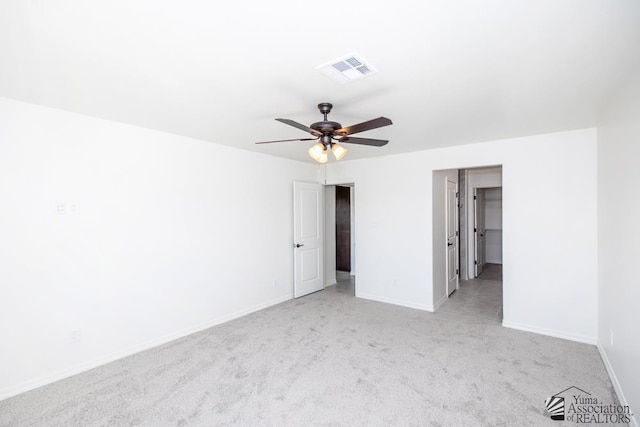 12683 E 51st Pl, Yuma, AZ 85367 - unfurnished bedroom featuring carpet flooring, a walk in closet, and ceiling fan