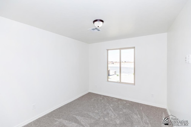 12683 E 51st Pl, Yuma, AZ 85367 - carpeted spare room featuring baseboards