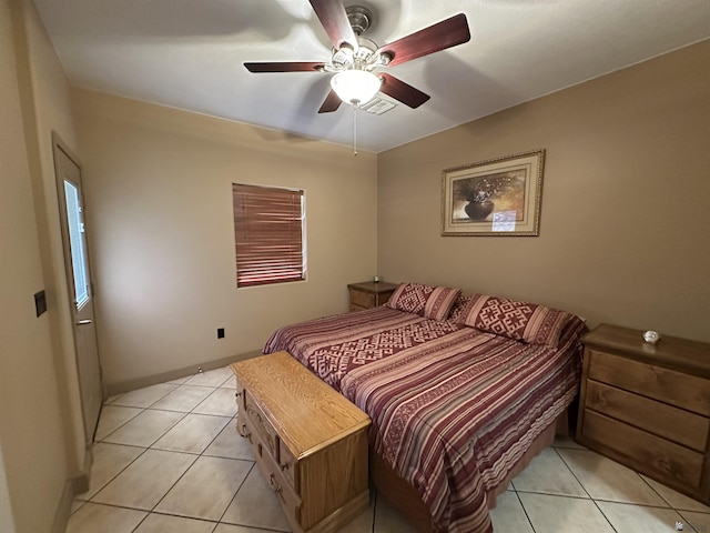 14411 E 50th Dr, Yuma, AZ 85367 - bedroom with light tile patterned flooring and ceiling fan