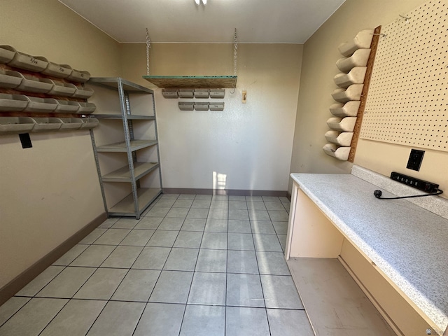 14411 E 50th Dr, Yuma, AZ 85367 - unfurnished dining area with light tile patterned floors and baseboards