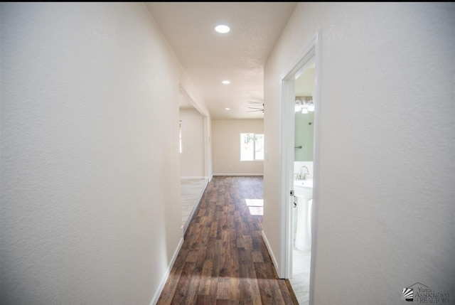 350 S Monte Vis, Yuma, AZ 85364 - hall with dark wood-style flooring, baseboards, and recessed lighting