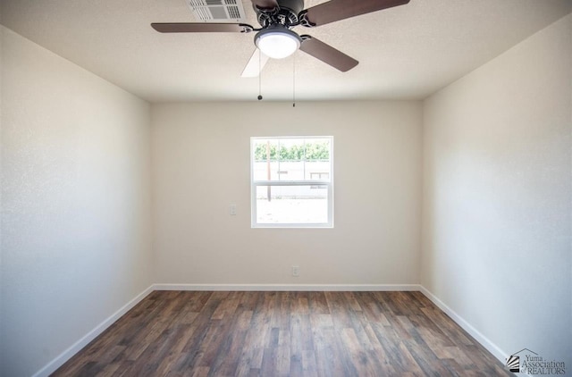 350 S Monte Vis, Yuma, AZ 85364 - unfurnished room with baseboards, a ceiling fan, wood finished floors, and visible vents