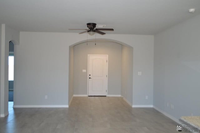 13113 E 54th St Lot 37, Yuma, AZ 85367 - spare room featuring arched walkways and ceiling fan