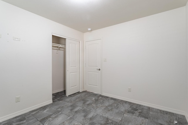 3830 E Jett St, San Luis, AZ 85336 - unfurnished bedroom with a closet and baseboards