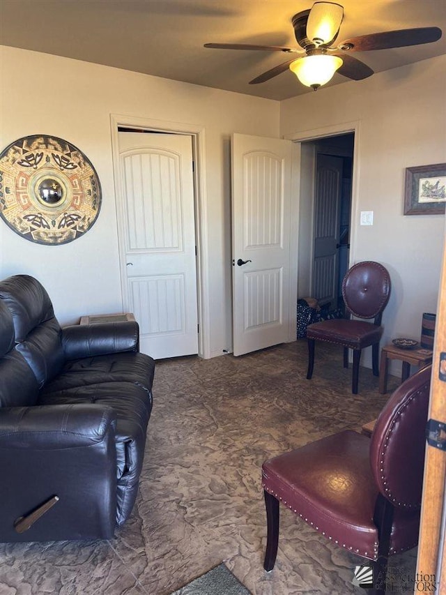 living room with ceiling fan