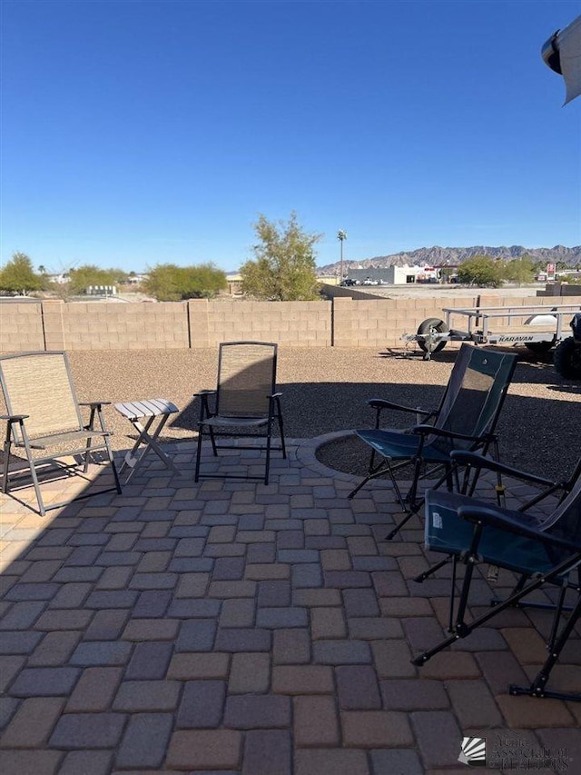 view of patio with a mountain view