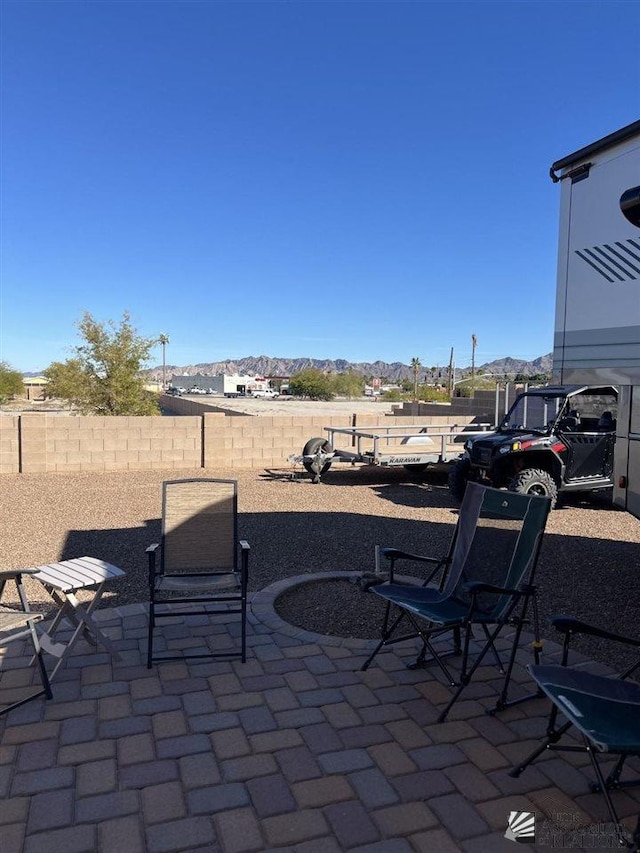 view of patio with a mountain view