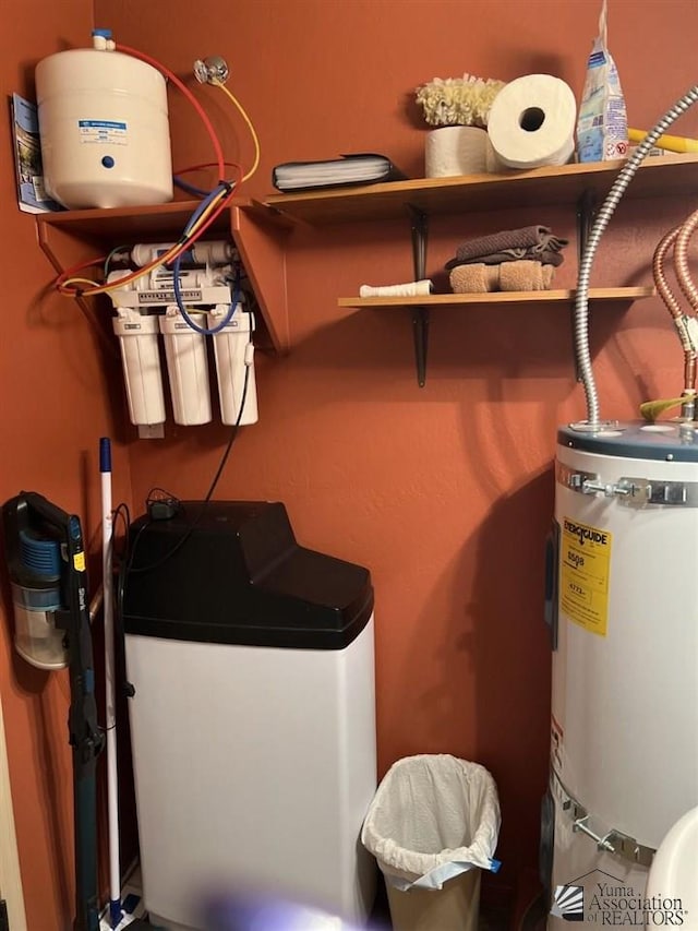 utility room with water heater