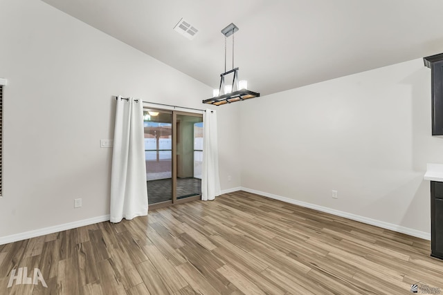 12616 E 49th Dr, Yuma, AZ 85367 - unfurnished dining area with baseboards, light wood finished floors, and visible vents