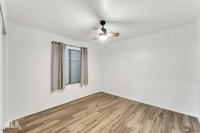 12616 E 49th Dr, Yuma, AZ 85367 - spare room with light wood-style floors, a ceiling fan, and baseboards