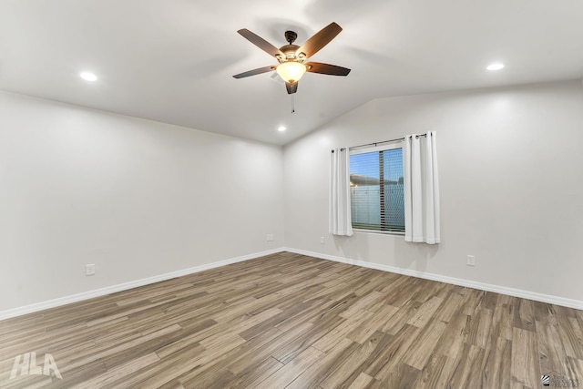 12616 E 49th Dr, Yuma, AZ 85367 - empty room with a ceiling fan, baseboards, wood finished floors, and lofted ceiling