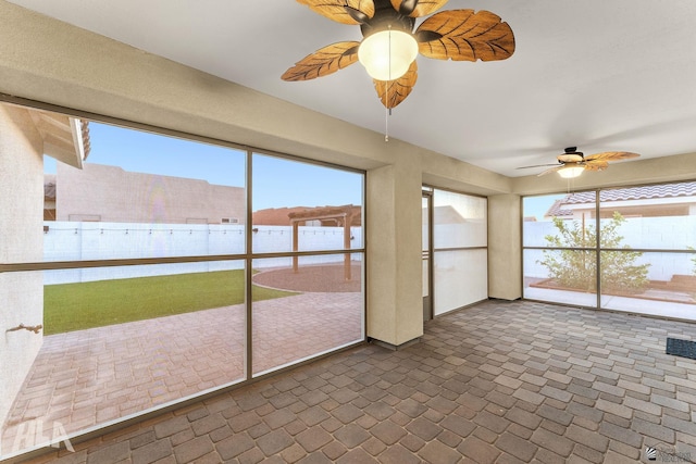 12616 E 49th Dr, Yuma, AZ 85367 - unfurnished sunroom featuring a wealth of natural light