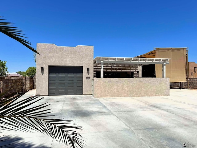 14442 E 54th St, Yuma, AZ 85367 - view of front of home with fence, an attached garage, driveway, and stucco siding