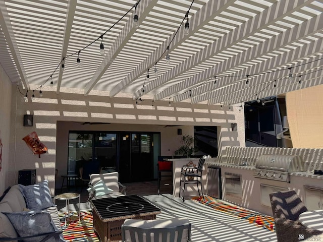 view of patio / terrace with an outdoor kitchen, a pergola, grilling area, and outdoor lounge area