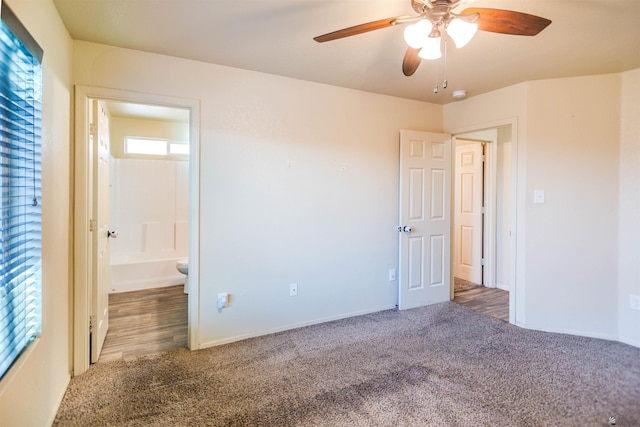 4780 W 11th Ln, Yuma, AZ 85364 - unfurnished bedroom with carpet floors, connected bathroom, baseboards, and a ceiling fan