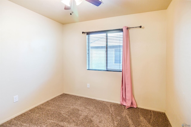 4780 W 11th Ln, Yuma, AZ 85364 - spare room with carpet, a ceiling fan, and baseboards