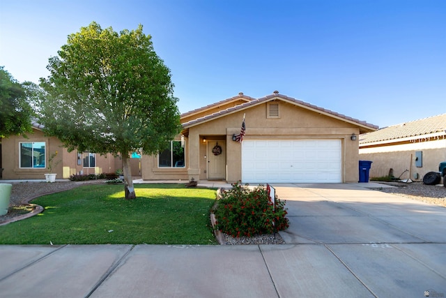 4780 W 11th Ln, Yuma, AZ 85364 - ranch-style house with concrete driveway, a garage, stucco siding, and a front lawn