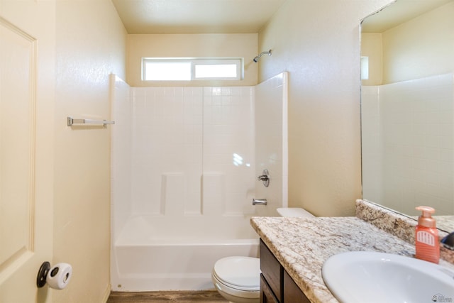4780 W 11th Ln, Yuma, AZ 85364 - full bathroom featuring vanity, toilet, shower / bathtub combination, and wood finished floors