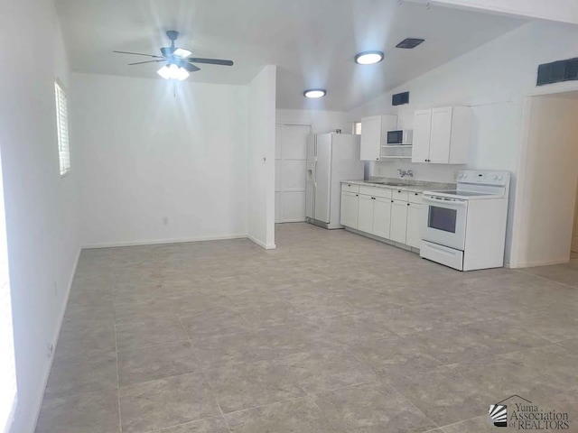 183 E 25th Pl, Yuma, AZ 85364 - kitchen with white appliances, a ceiling fan, light countertops, white cabinets, and lofted ceiling