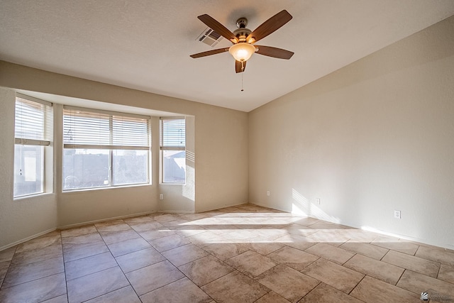 unfurnished room with ceiling fan