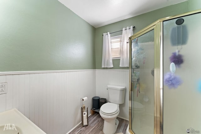 14419 E Fortuna Palms Pl, Yuma, AZ 85367 - full bathroom with wainscoting, toilet, a shower stall, and wood finished floors