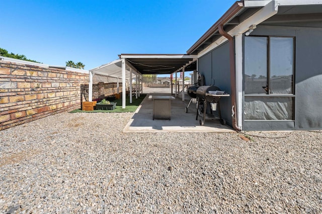 14419 E Fortuna Palms Pl, Yuma, AZ 85367 - view of patio with a fenced backyard and a grill