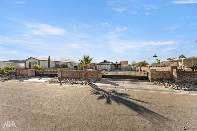 14419 E Fortuna Palms Pl, Yuma, AZ 85367 - ranch-style home featuring a gate and a fenced front yard