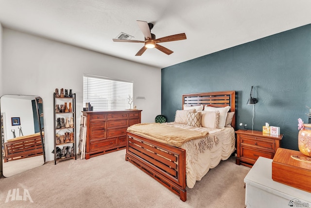 carpeted bedroom with ceiling fan